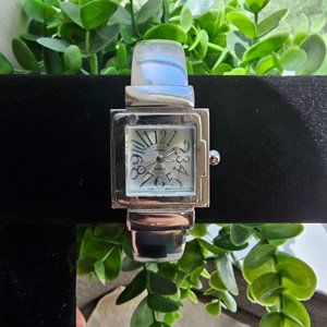 Lady's Milano Quartz Silver Tone Cuff Watch